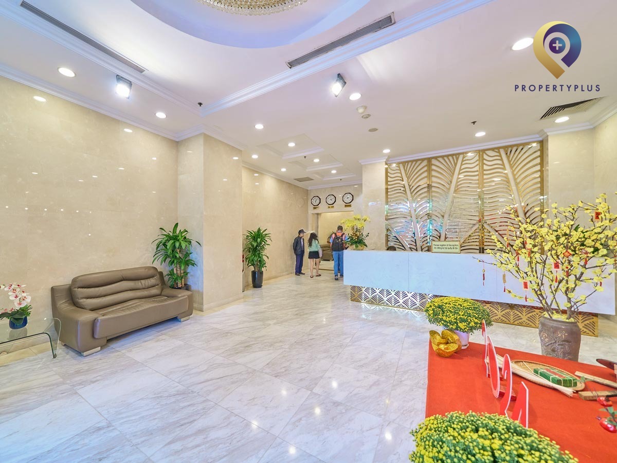 Main lobby on the first floor of Hòa Bình Tower with elegant design and welcoming atmosphere.